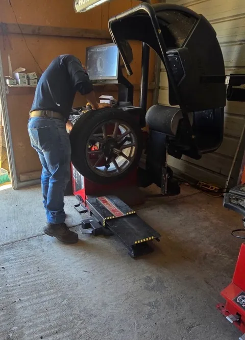 Wheel on a Hunter balancing machine in the shop